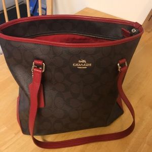 Red and brown coach purse